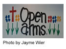 0807openarmsstorysign.jpg